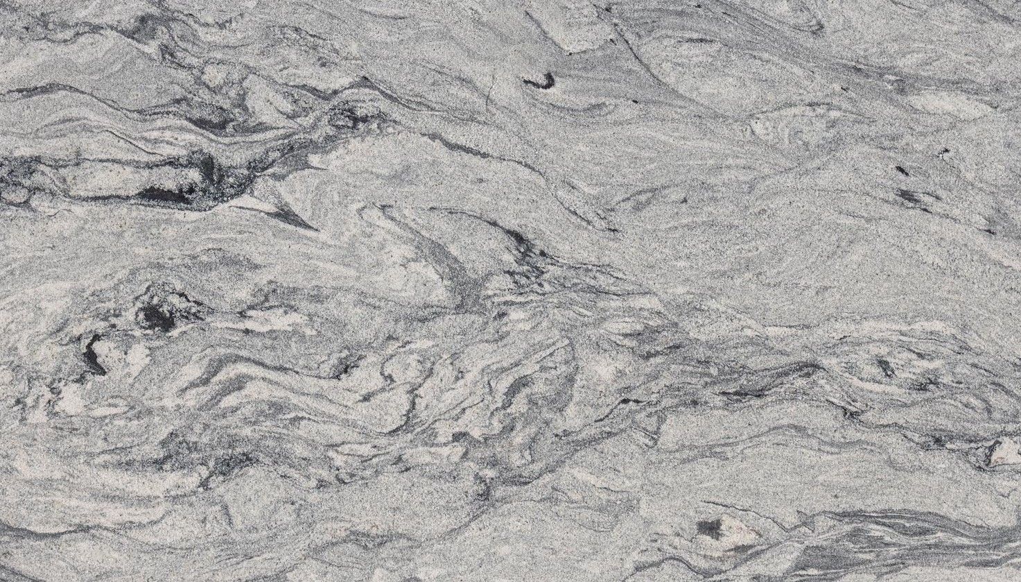Gray and white granite with wavy, flowing patterns and dark veins.