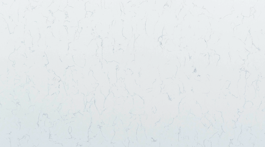 White quartz countertop with subtle, grey veining.