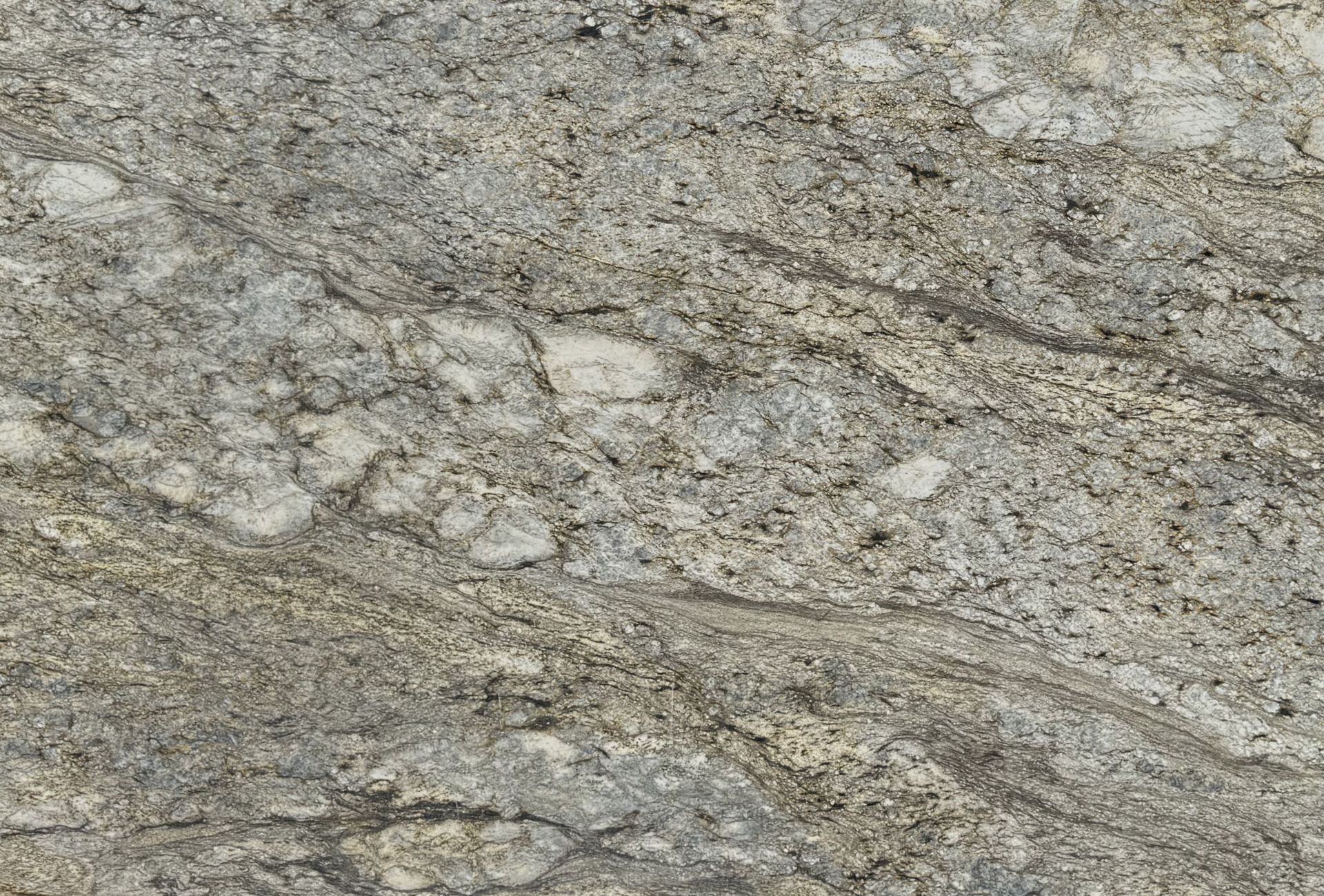 Gray and beige granite countertop with swirling patterns and some darker veins.