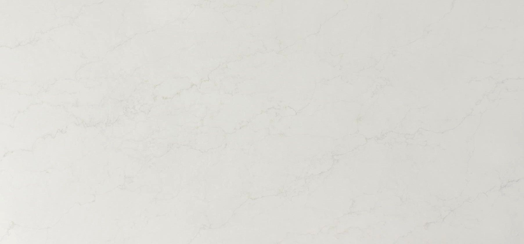 White quartz countertop with subtle gray veining.