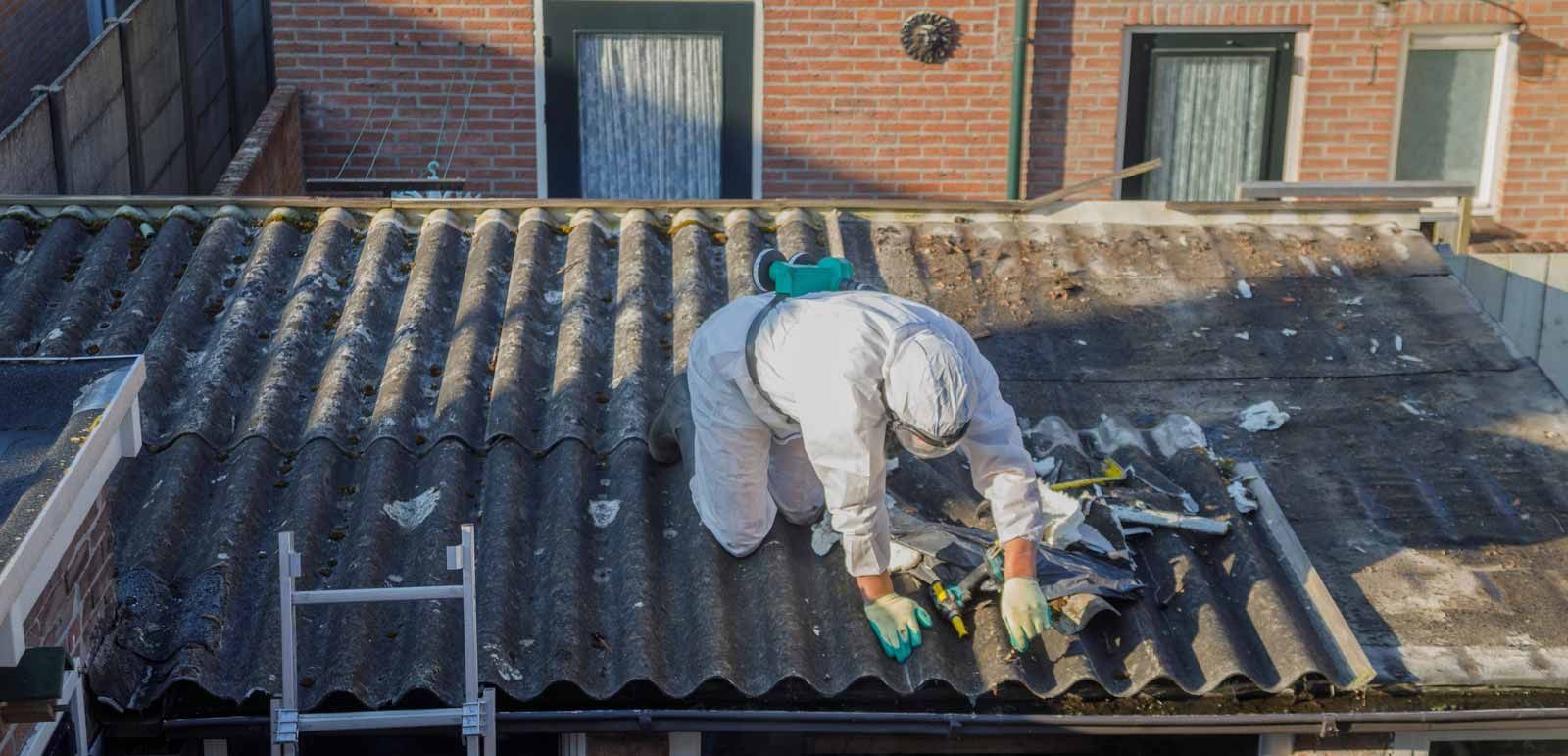 Asbestos-containing building materials prepared for safe removal