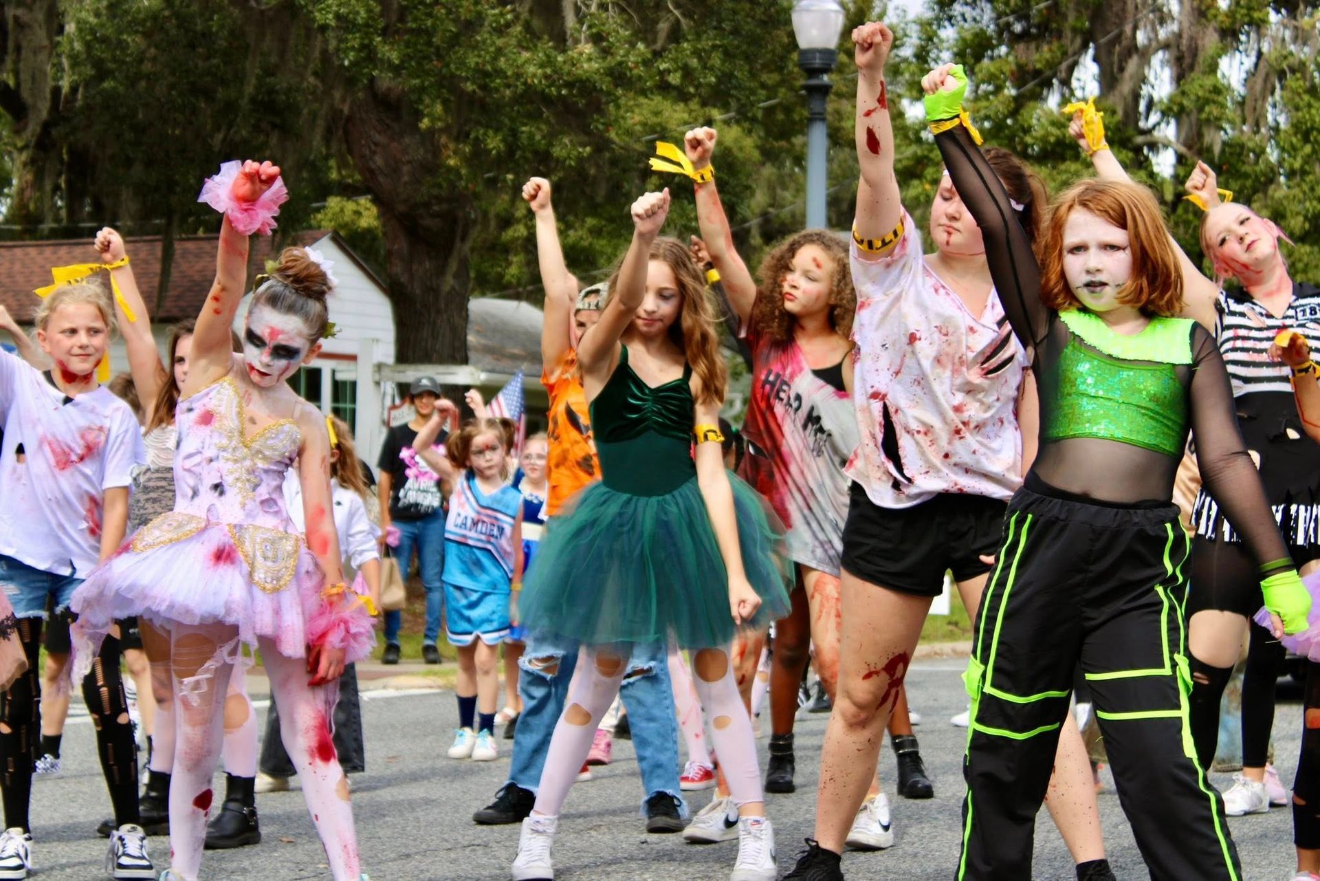 Lisa Allen's Dance Works dancers performing in a local community parade