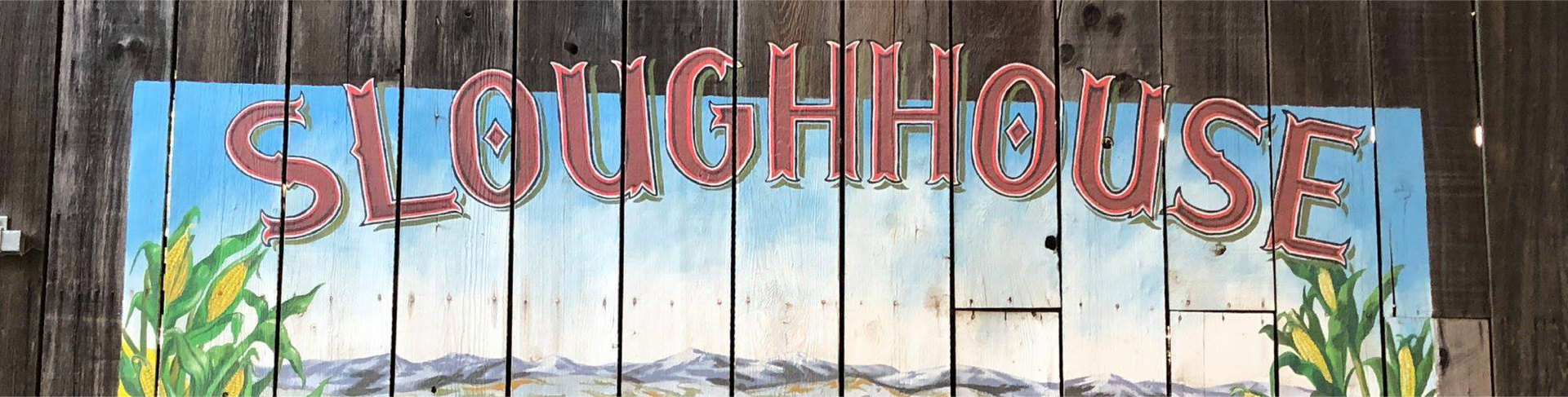 Sign painted on wood with