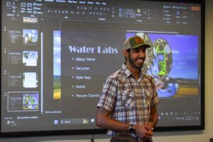 Man presenting a PowerPoint on