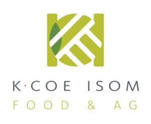 Logo for K.Coe Isom, a food and agriculture company, with a green geometric design.