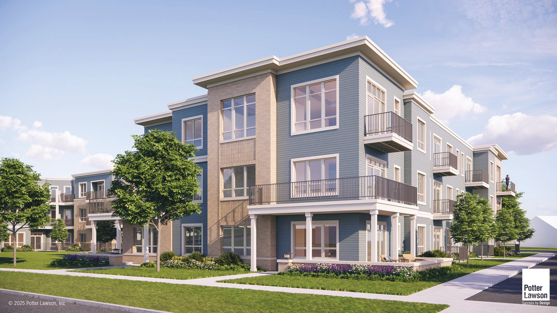 Modern three-story apartment building with gray siding, balconies, and landscaped sidewalks in a sunny neighborhood