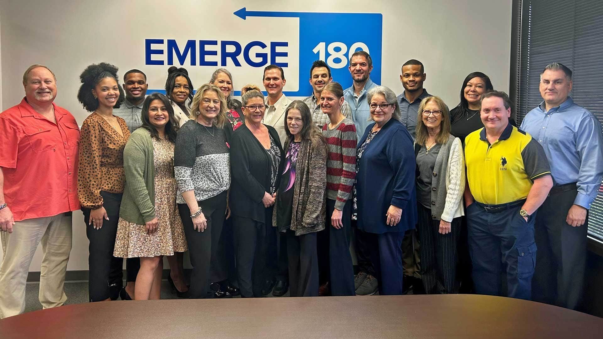 Photo of the Emerge180 team posting as a group