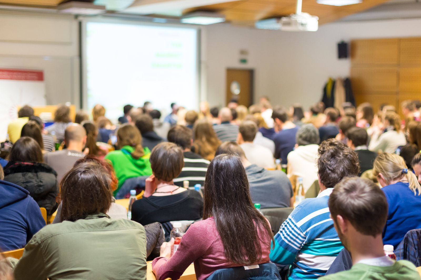 Audience listening to a speaker
