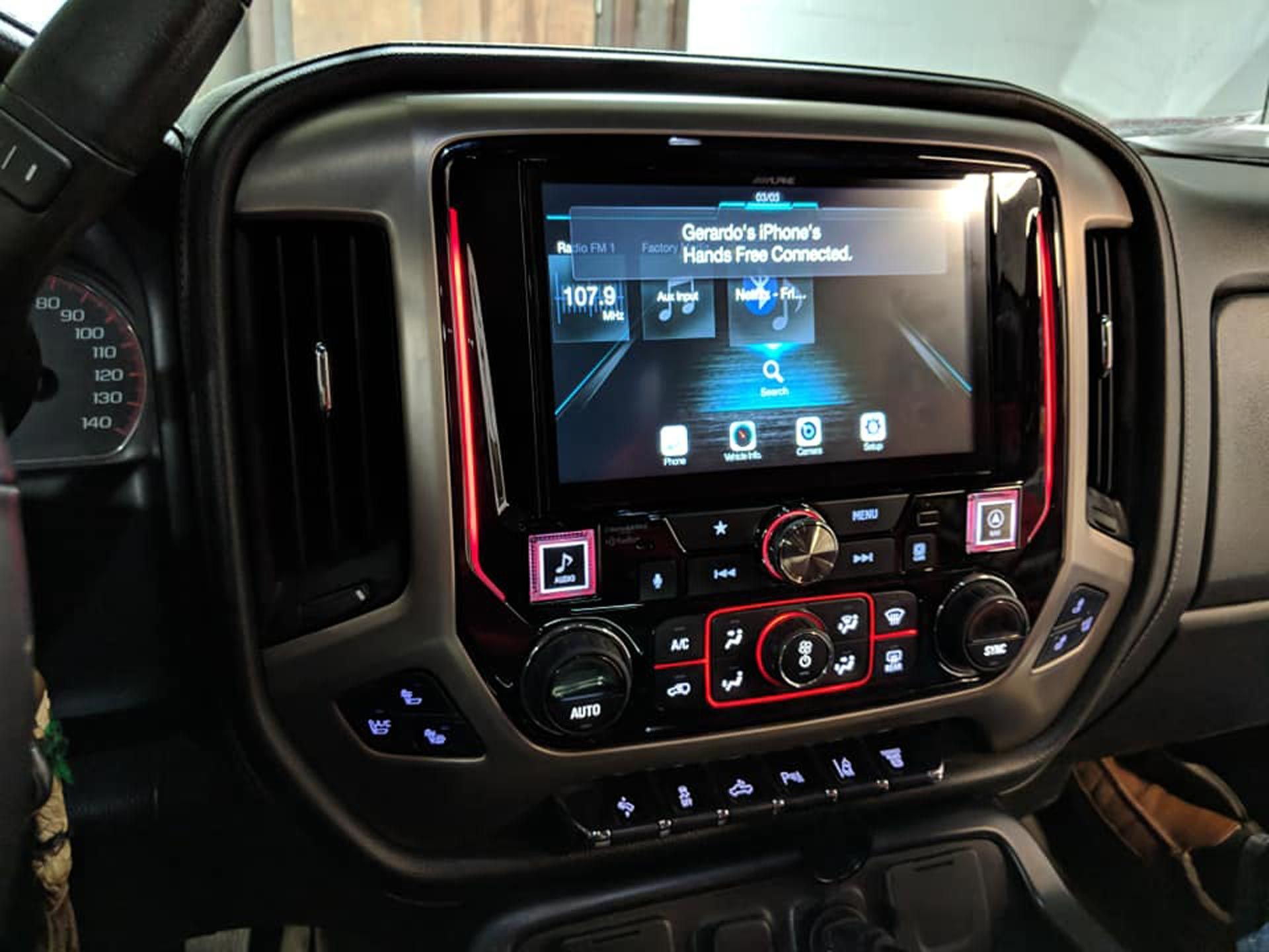 The dashboard of a truck with a touchscreen radio