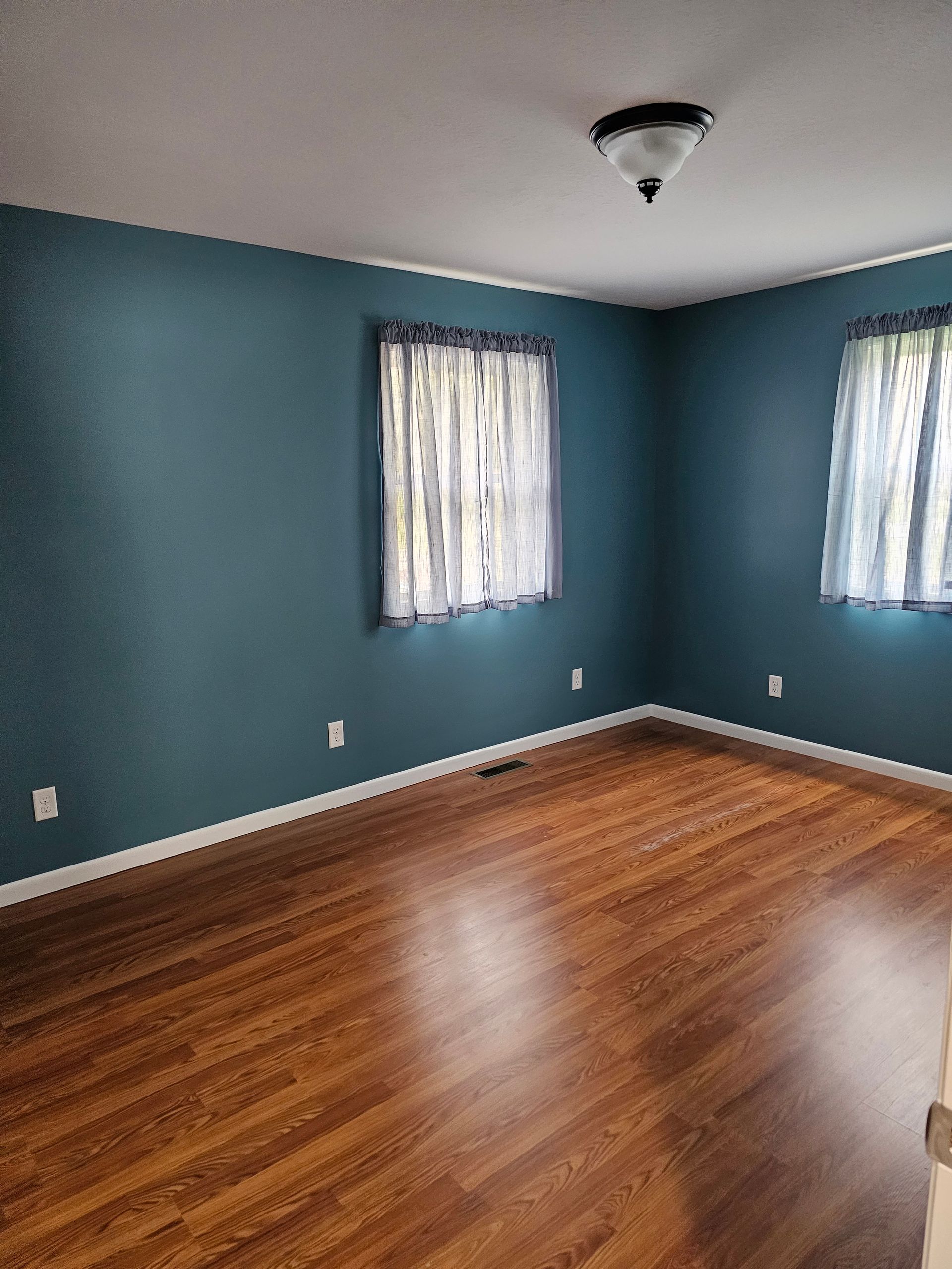 Dark blue accent wall interior painting project in Ohio home