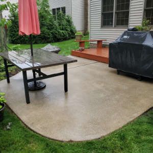 Clean concrete patio after professional pressure washing by NORTHCOAST Painting and Pressure Washing in Northeast Ohio