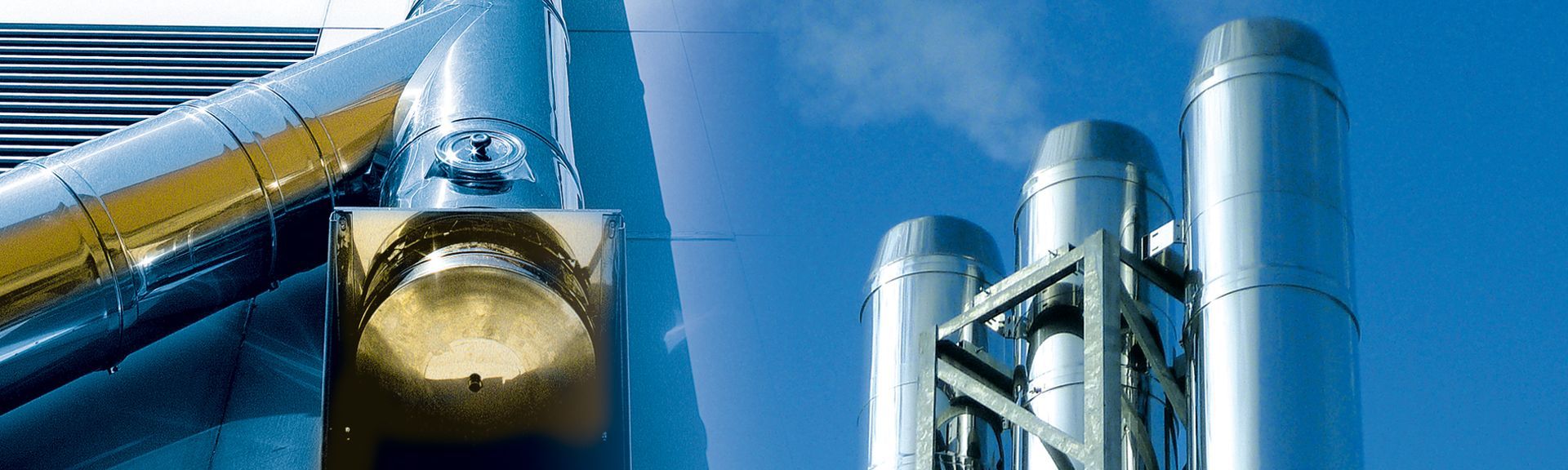 L'immagine di una fabbrica con un cielo azzurro sullo sfondo.
