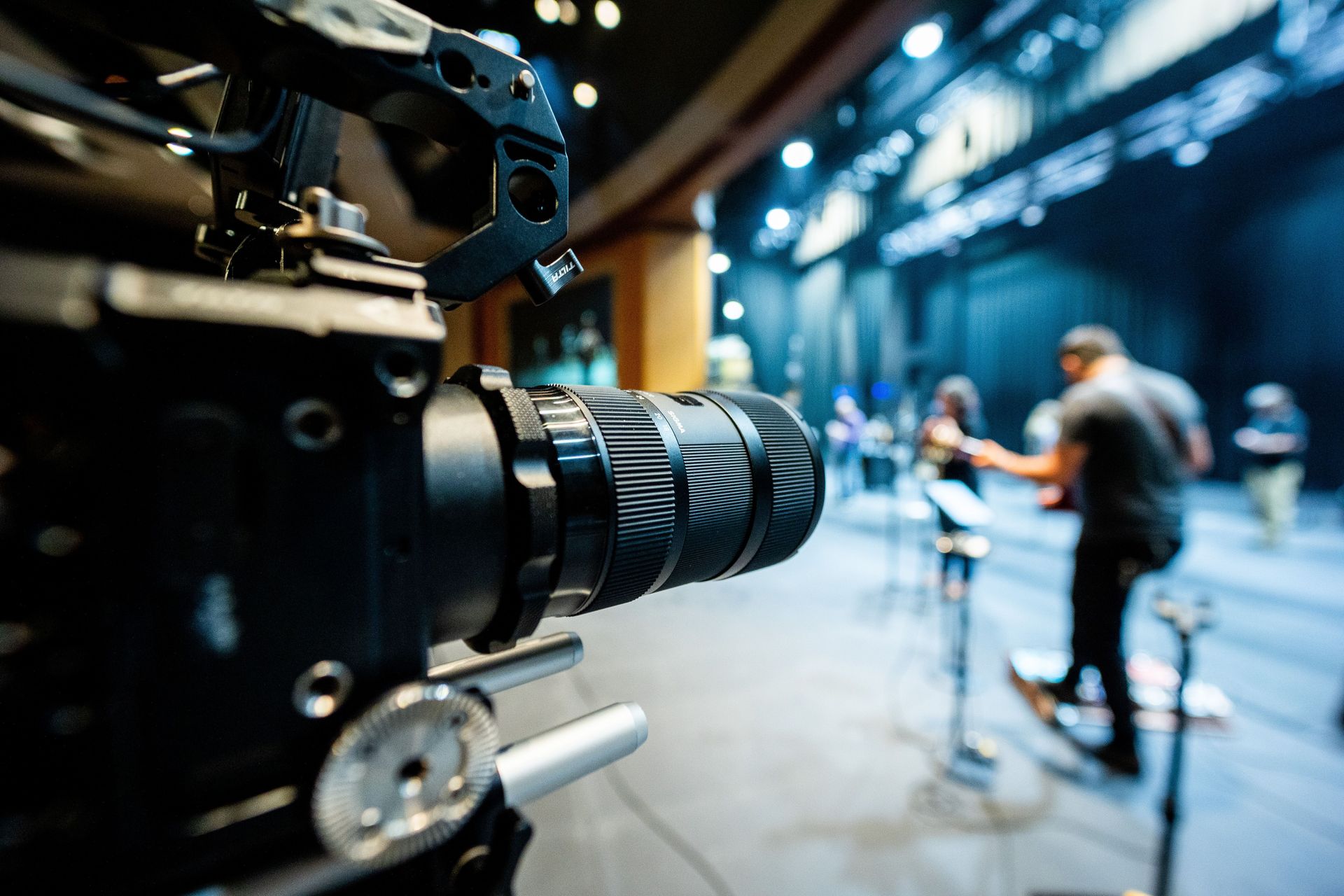 Cinema camera and crew filming on a stage for a Frame Content House commercial brand film