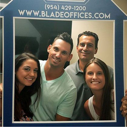 Friends Posing for a Picture | Deerfield Beach, FL | Blade Title Company