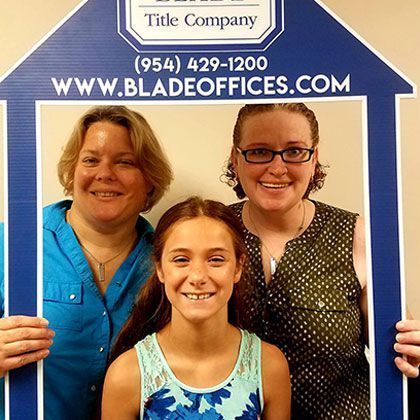 Middle-Aged Women and Young Girl Posing for a Picture | Deerfield Beach, FL | Blade Title Company