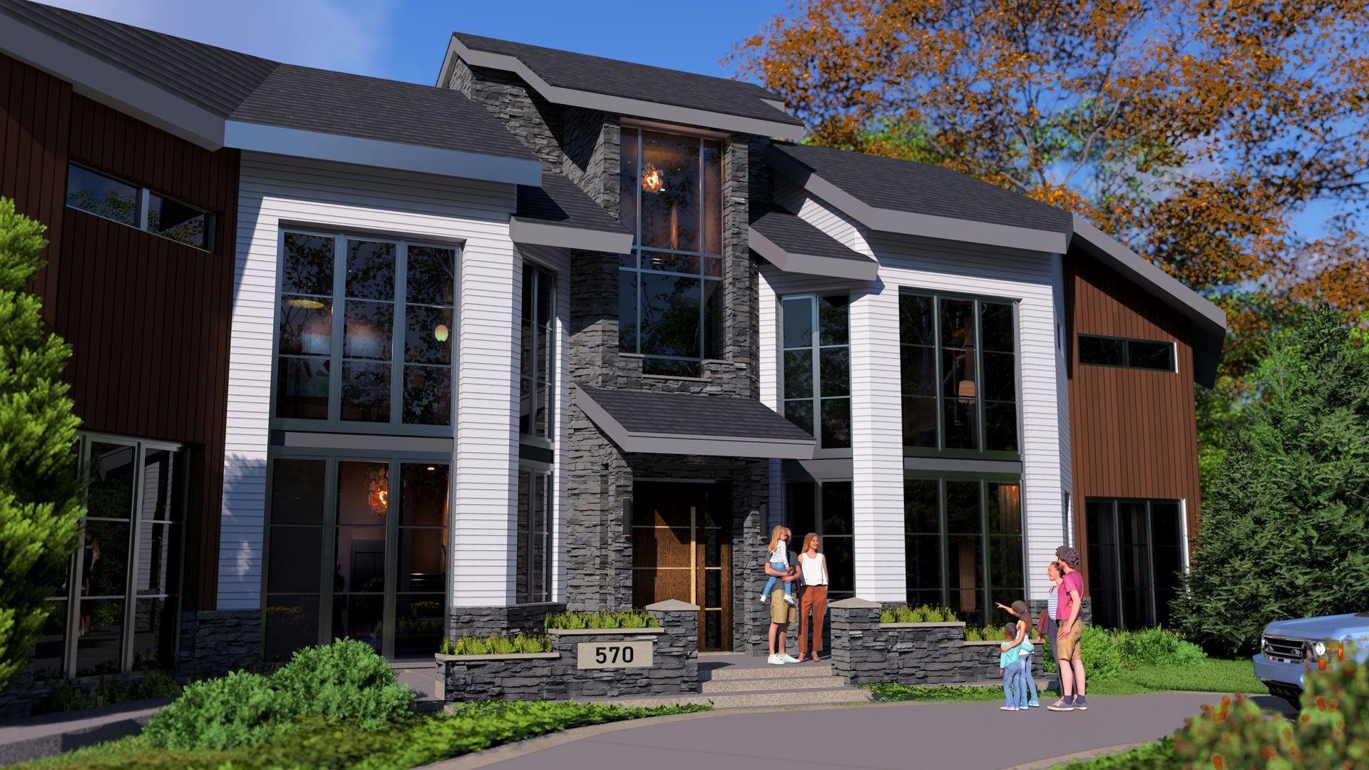 A couple of people standing in front of a large house.