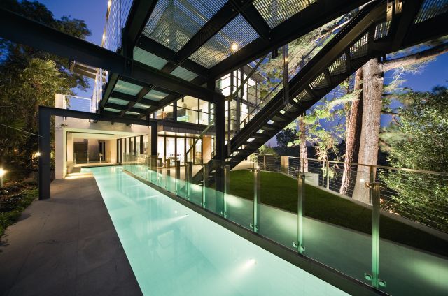 A Swimming Pool With a Glass Fence — Morwell, VIC — Gippsland Windows