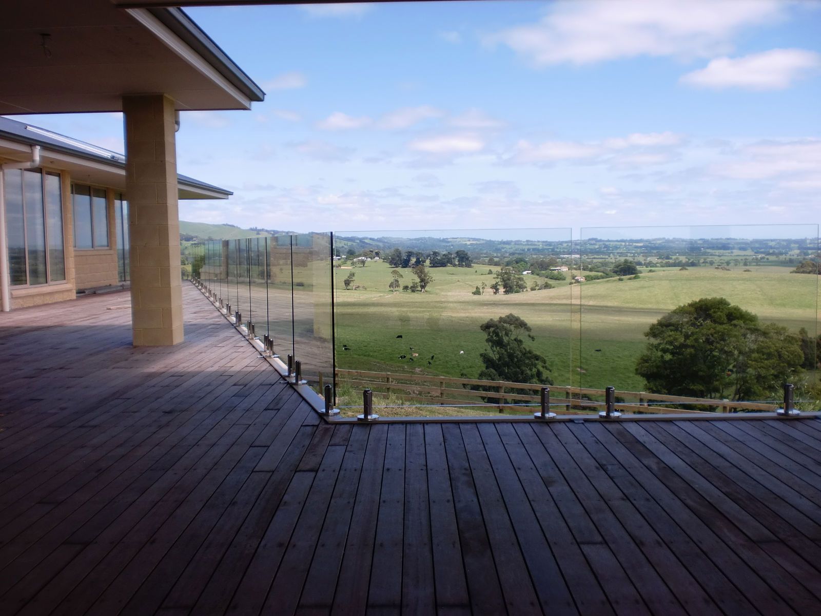 A Wooden Deck With a Glass Railing — Morwell, VIC — Gippsland Windows