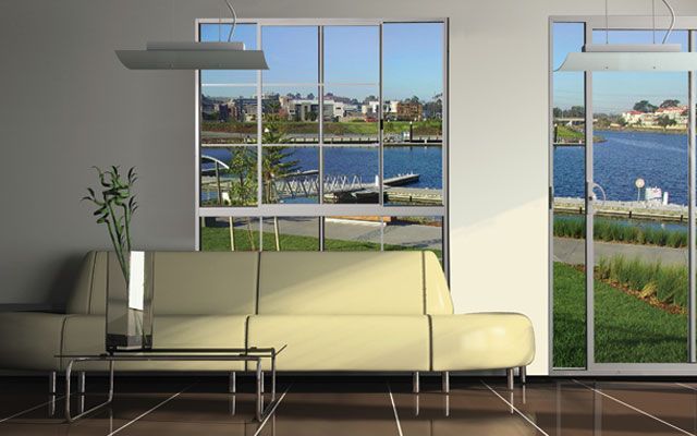 A Living Room With a Couch and a View of a Lake — Morwell, VIC — Gippsland Windows