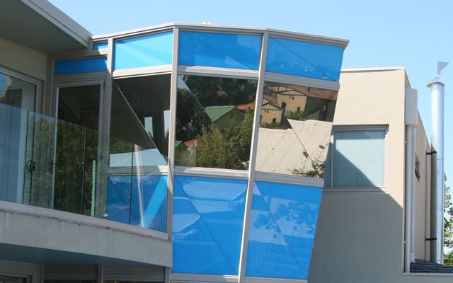 A Building With Blue Windows and a Balcony — Morwell, VIC — Gippsland Windows