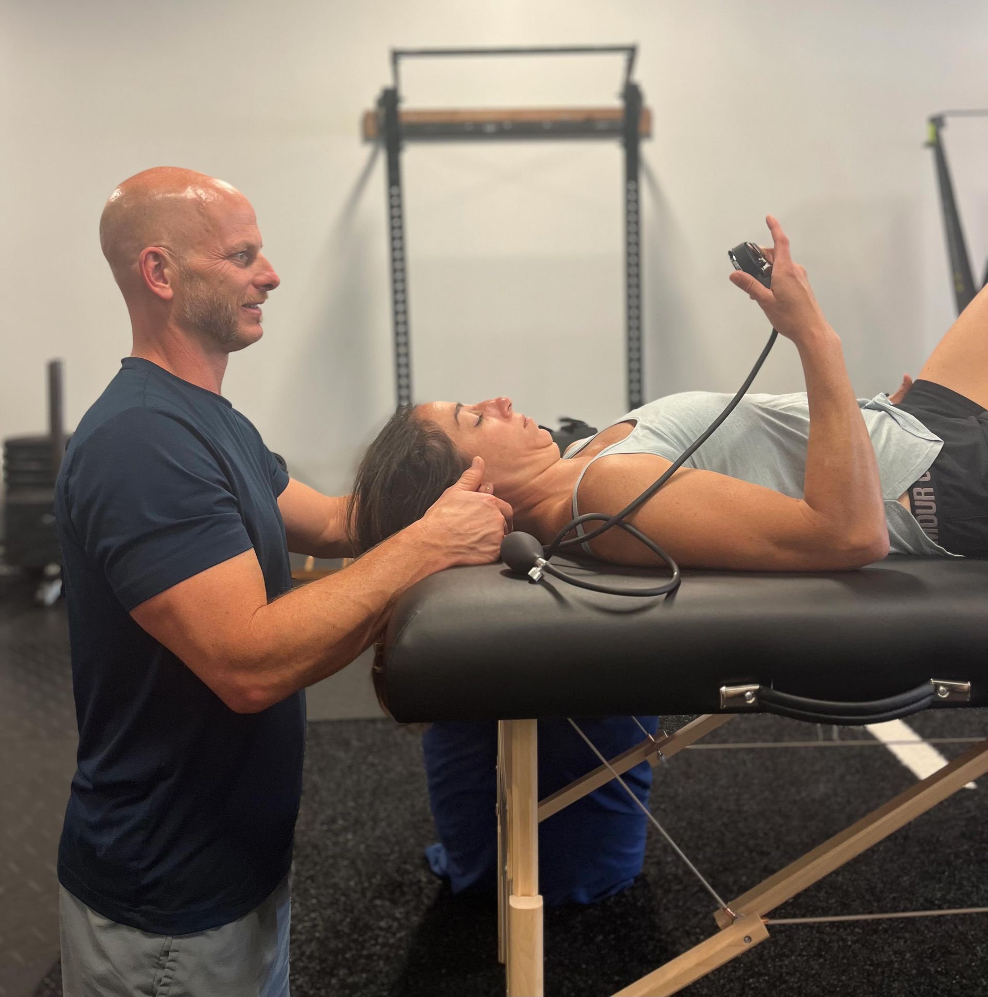 Man Guiding The Woman - Chicago, IL - Fast Track Physio