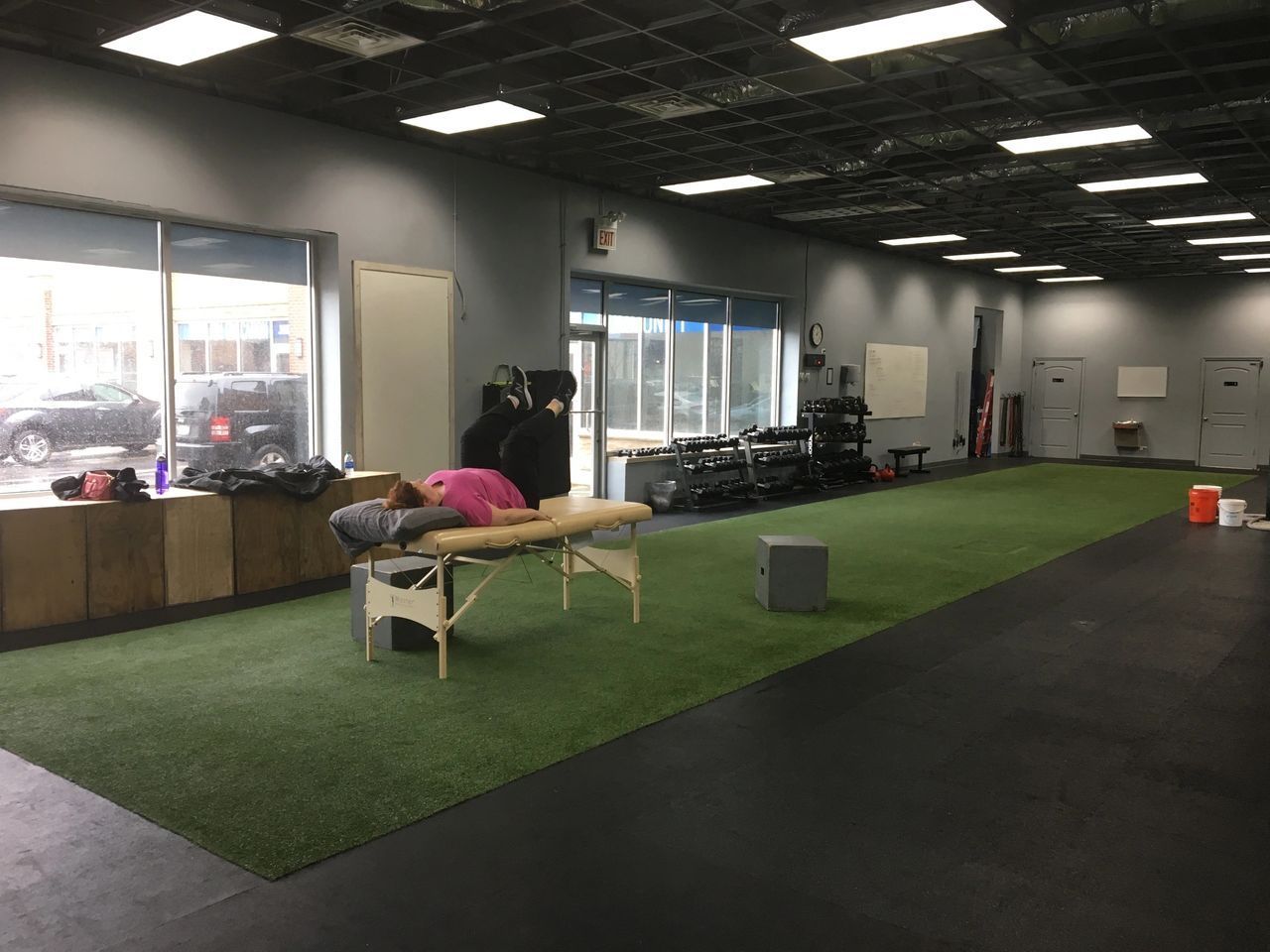 Woman Exercising on Massage Table - Chicago, IL - Fast Track Physio