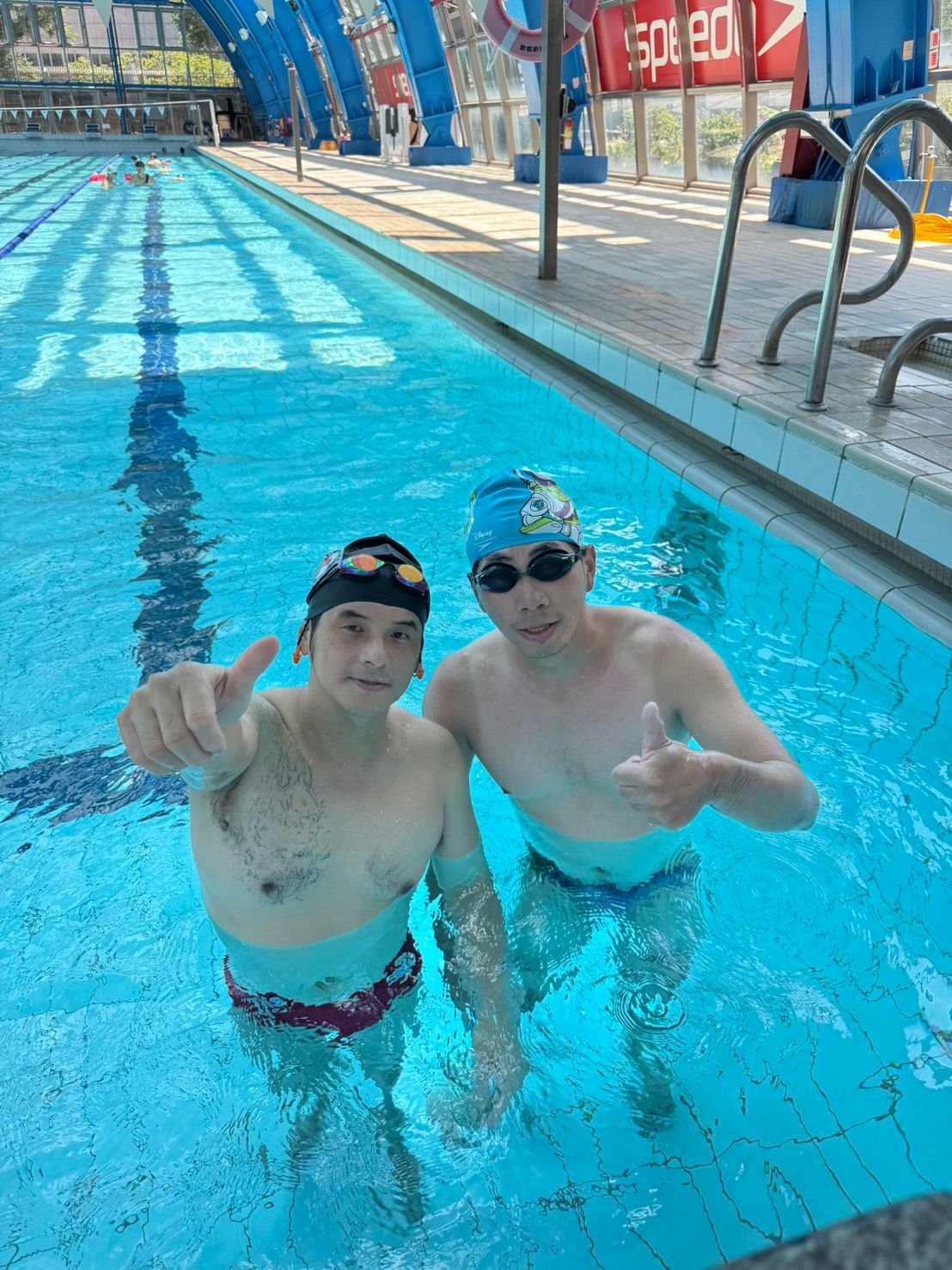 photorealistic training session at a pool coach observing students with care natural lighting
