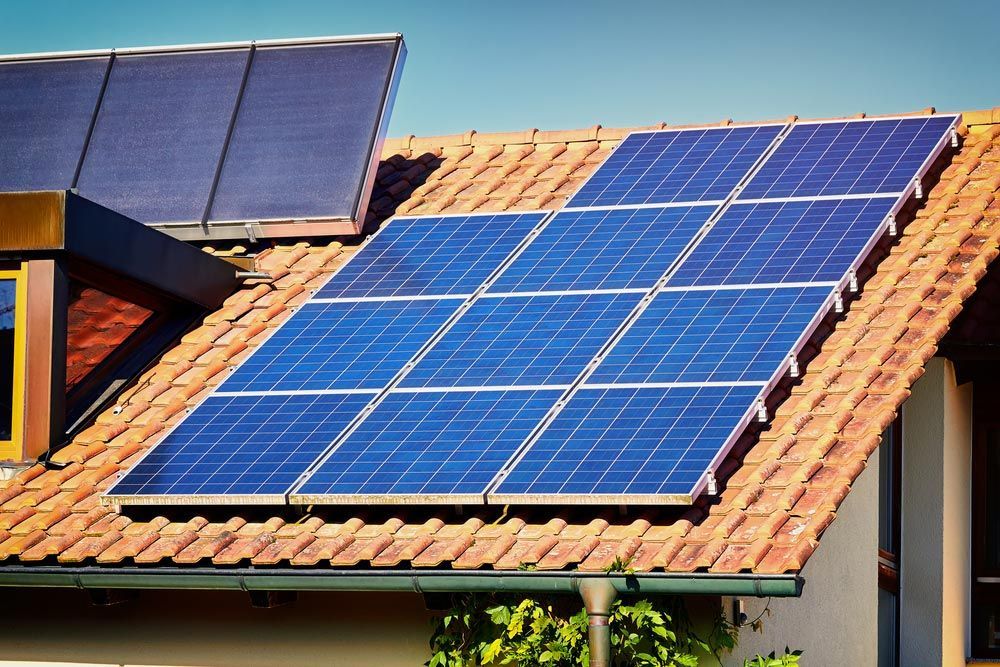 Row Of Solar Panels On The Roof — Anthony Cameron Electrical & Solar in Kepnock, QLD