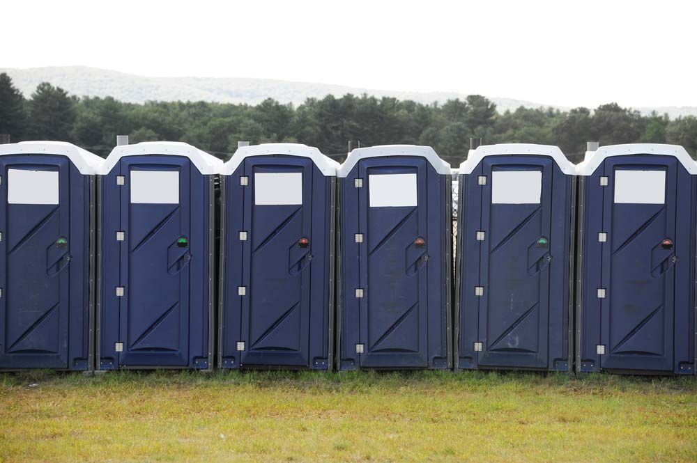 Portable Toilet in A Row Outdoor — Waste Removal in Casino, NSW