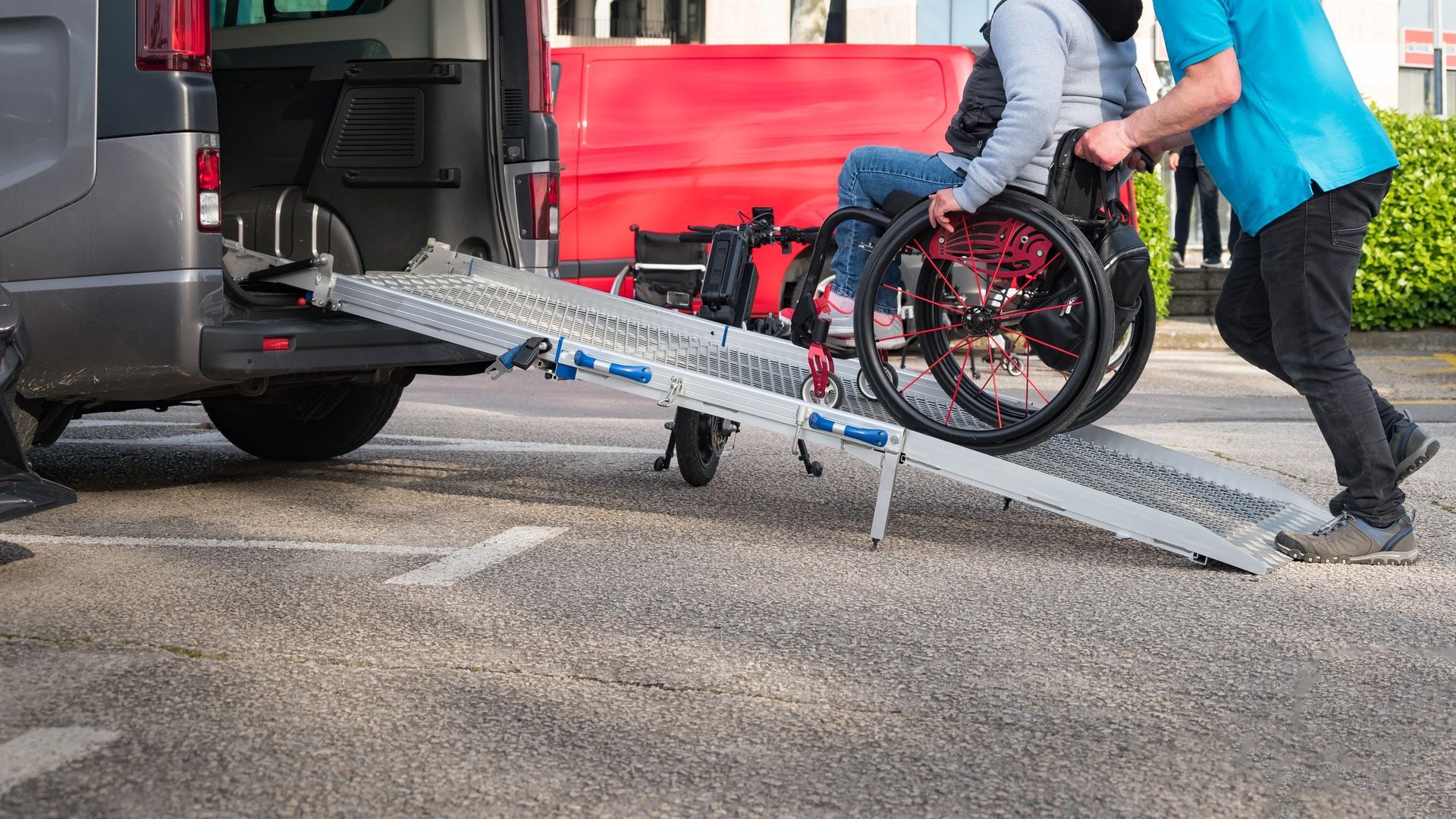 Assisting a Man on Wheelchair