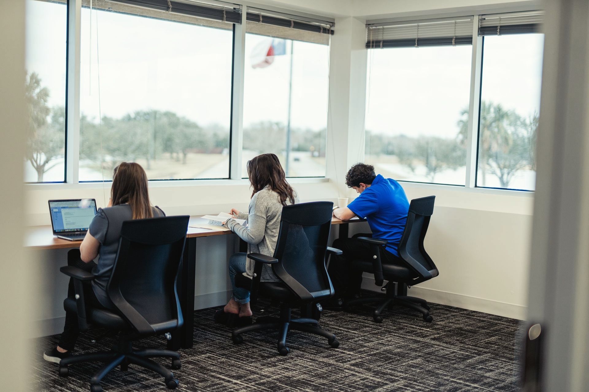 people in a private office