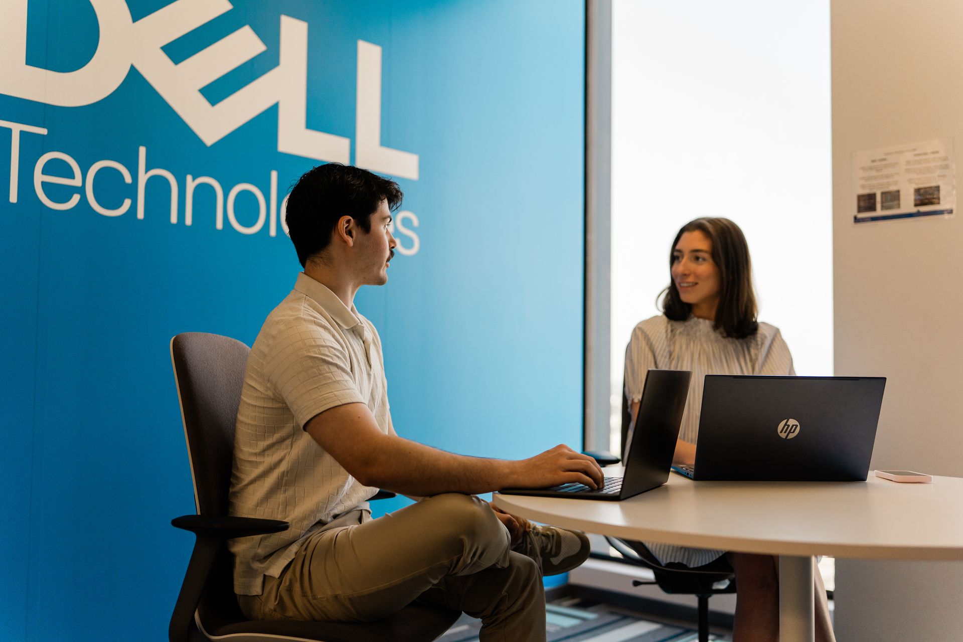 people working at a desk 