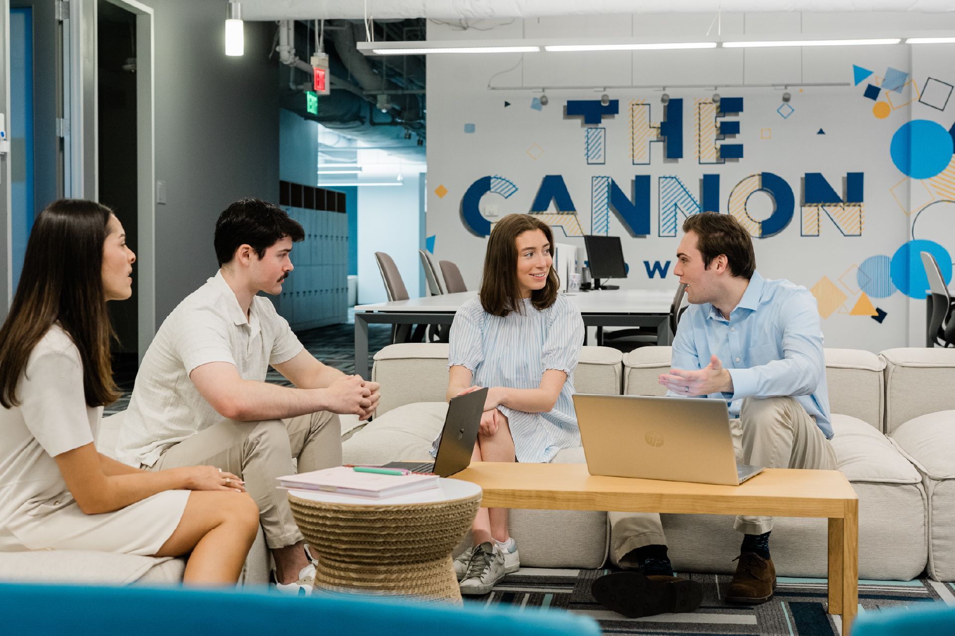 group of people working in a coworking space
