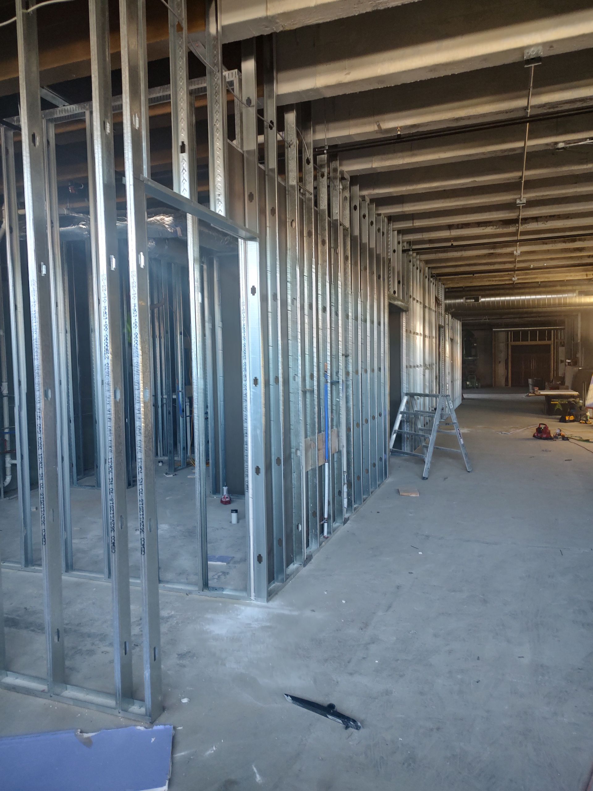 A building under construction with a lot of metal frames