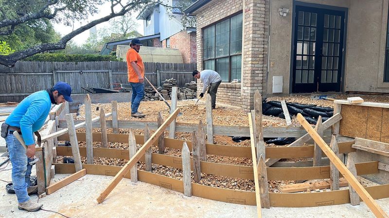Bravo Company crew setting forms for a concrete patio and steps in San Antonio
