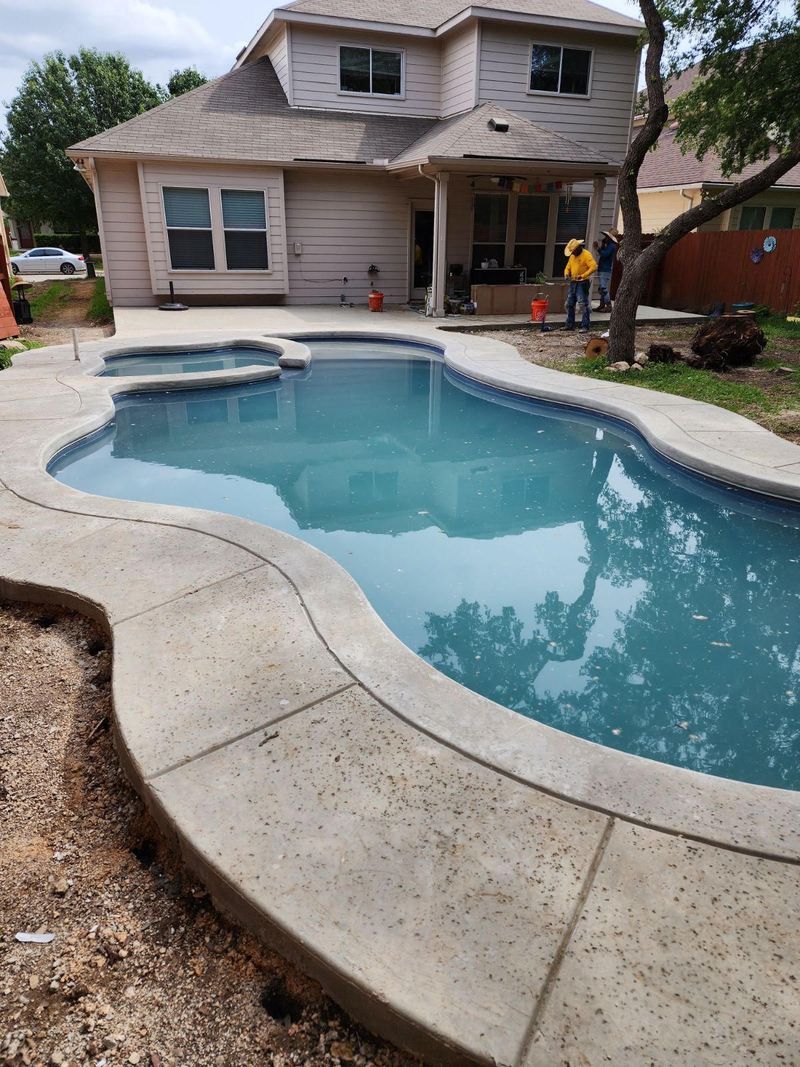Decorative finished concrete pool deck in San Antonio, TX