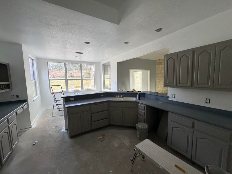Kitchen remodel with freshly painted cabinets