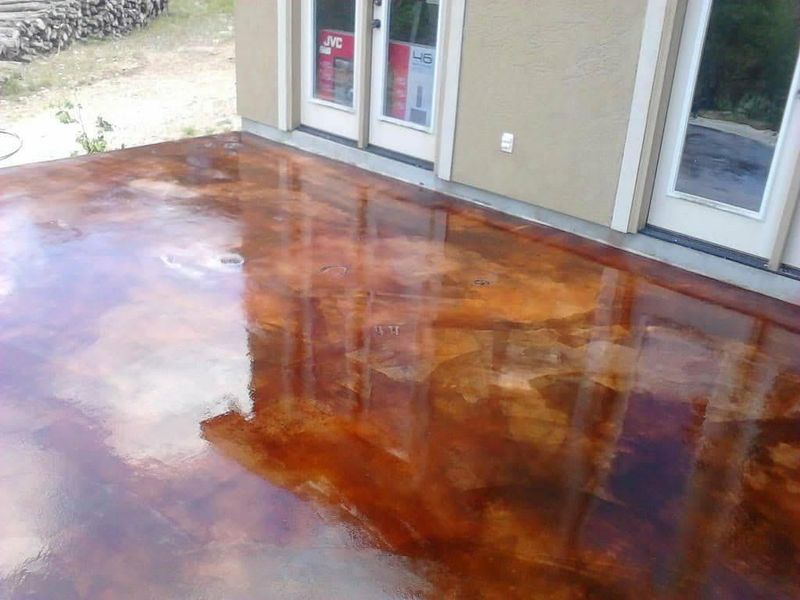 Stained concrete patio with a glossy finish