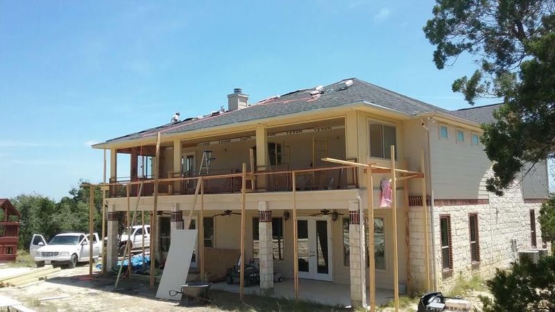 Two-story home addition with new roofing