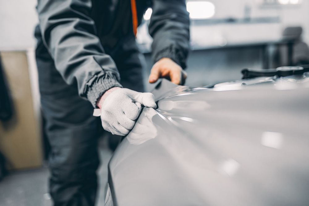 Person in Work Clothes and Gloves — RNA Mechanical In Nambour, QLD