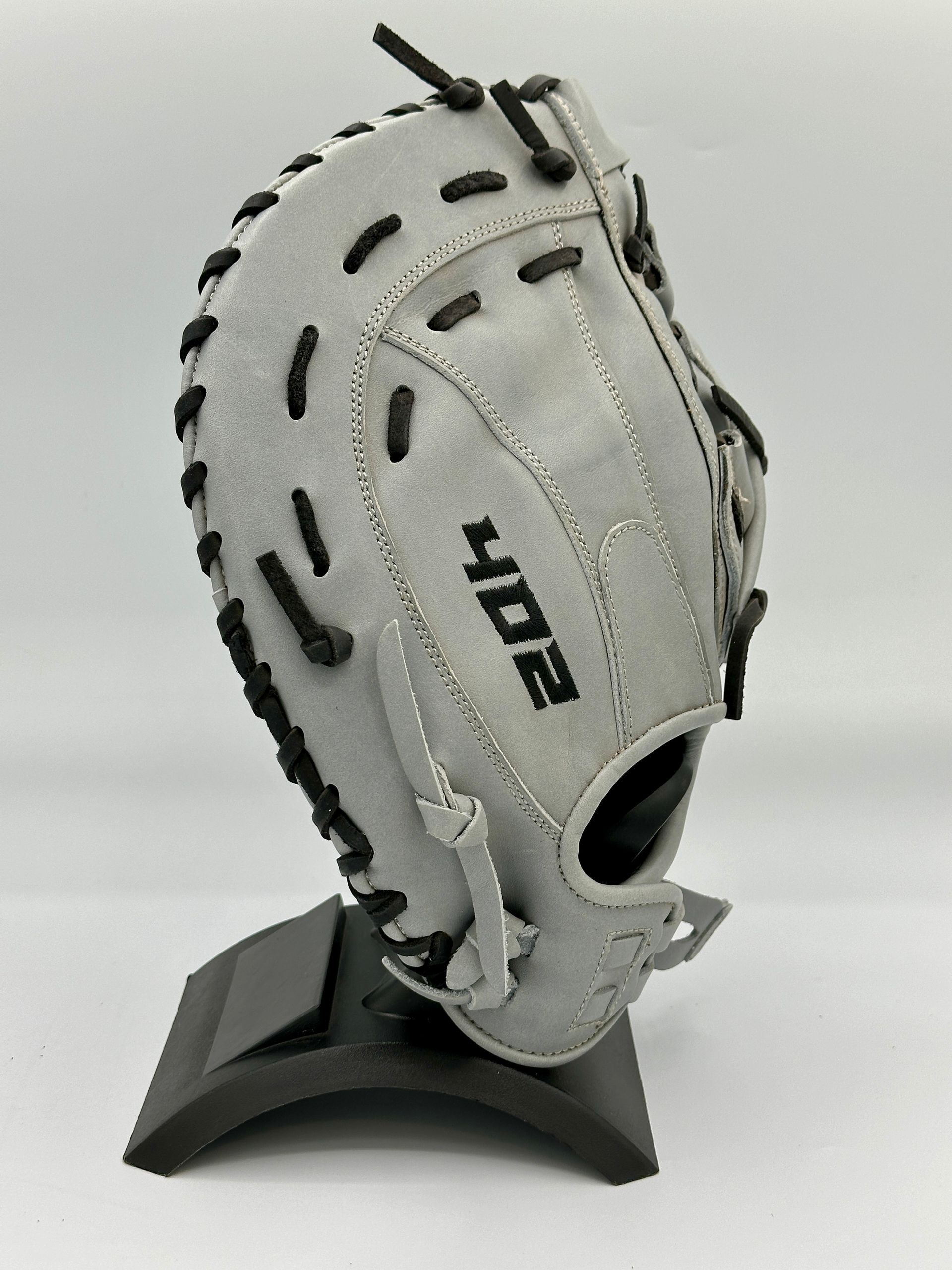 A baseball glove with the word hope on it
