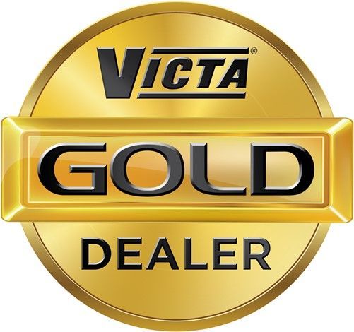 A gold badge that says victa gold dealer