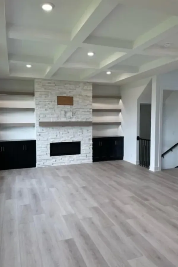 There is a fireplace in the middle of the room.