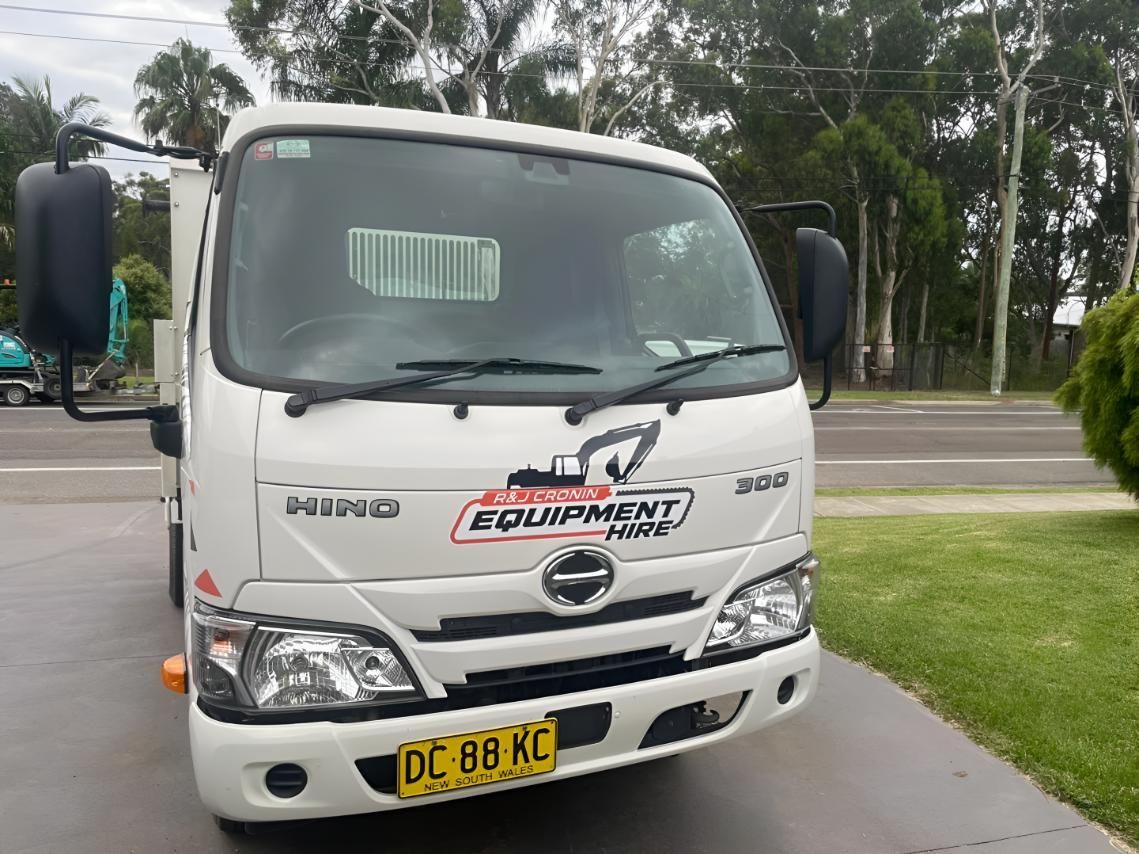 A White Truck with A License Plate — R&J Cronin Equipment Hire in Bonnells Bay, NSW