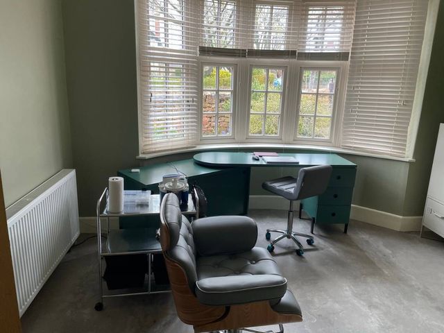 Michele's clinic room at Happy Ears in Woodthorpe, with a desk under the bay window and the treatment chair