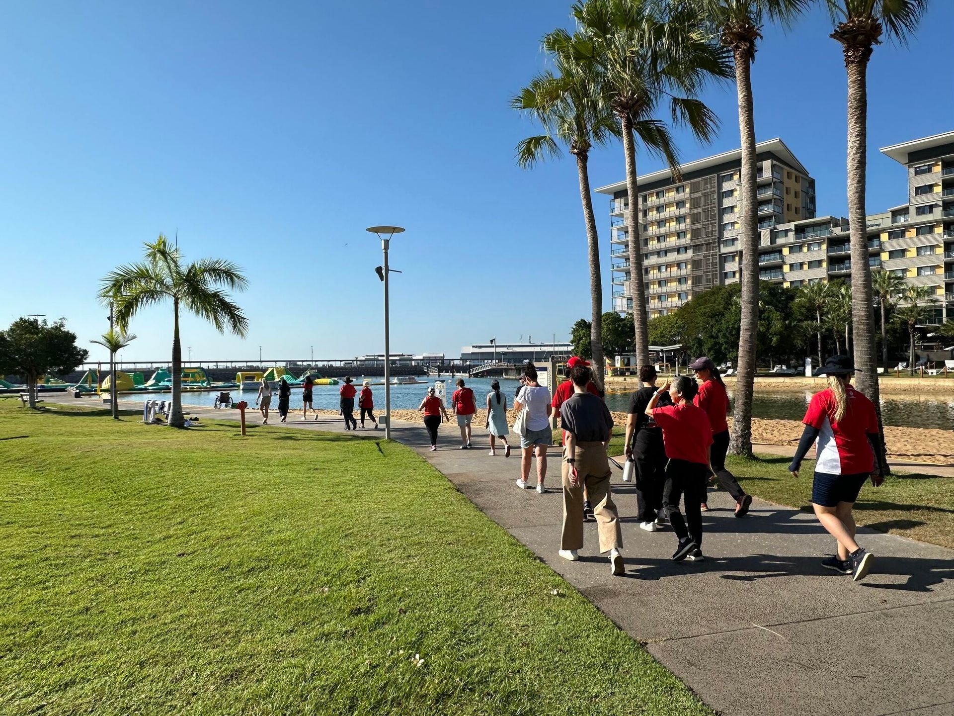 Group of women walking on the footpath near the Recreation lagoon
