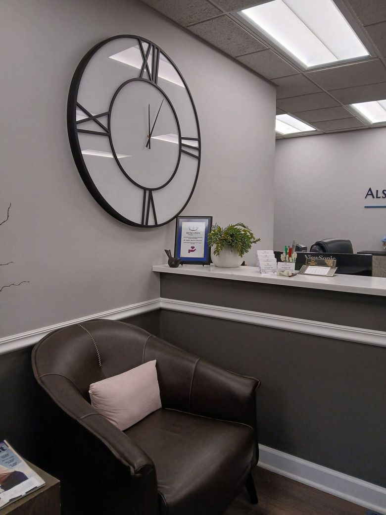 The front desk and seating area at Alsahlani and Albazzaz Dental