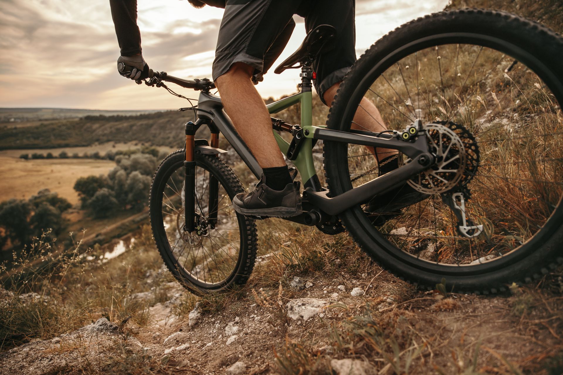 A person is riding a mountain bike on a trail.