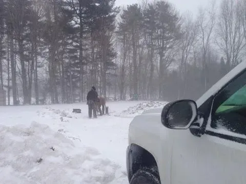Man On Snowy Forest - Stow, OH - Anderson Drilling & Pump, Inc