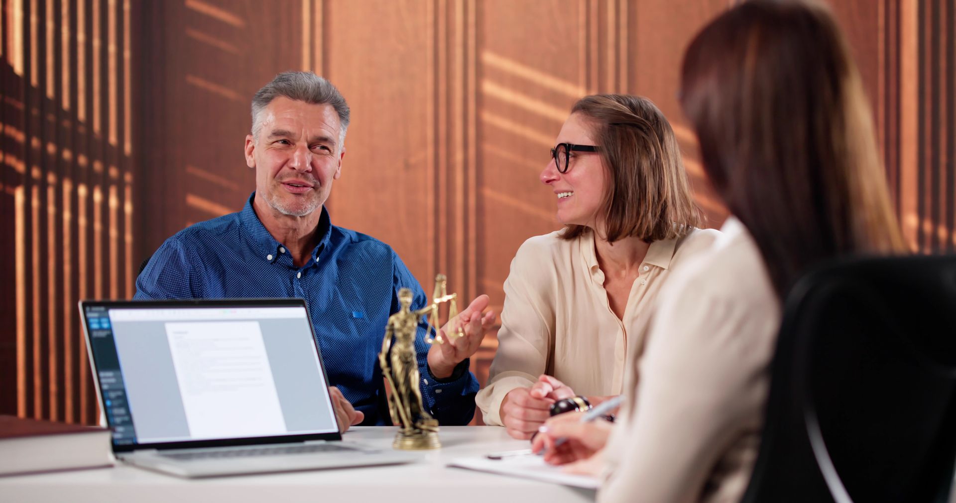 Family estate planning meeting with legal advisor.